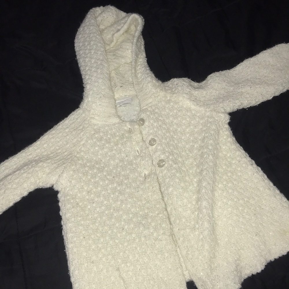 White knitted sweater for toddlers